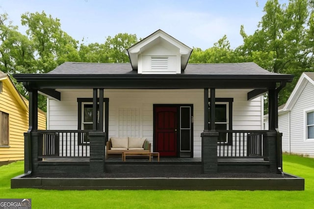 1192 Arlington Ave SW, Atlanta, GA 30310 - rear view of house featuring a porch, a shingled roof, and a yard