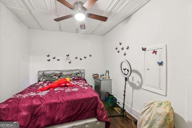 1192 Arlington Ave SW, Atlanta, GA 30310 - bedroom with wood finished floors, electric panel, a ceiling fan, and baseboards