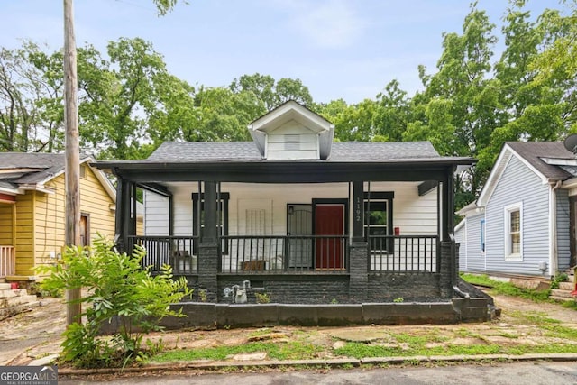1192 Arlington Ave SW, Atlanta, GA 30310 - view of front of property with a porch and a shingled roof