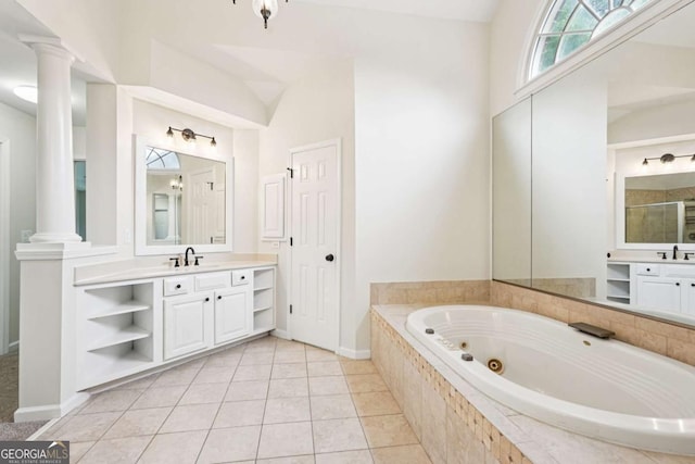 4508 Meadow Vista Trce, Lithonia, GA 30038 - full bathroom with a jetted tub, vanity, decorative columns, a stall shower, and tile patterned flooring