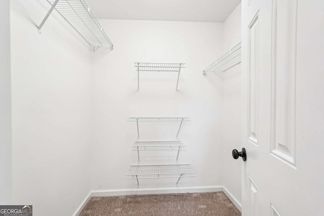 4508 Meadow Vista Trce, Lithonia, GA 30038 - spacious closet featuring carpet
