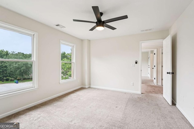 4508 Meadow Vista Trce, Lithonia, GA 30038 - unfurnished room with carpet floors and a ceiling fan