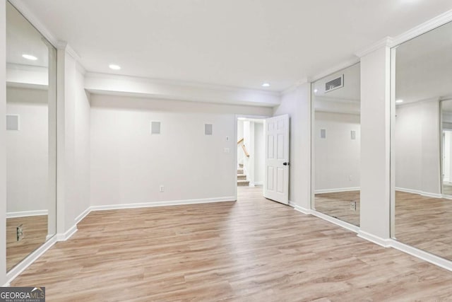 4508 Meadow Vista Trce, Lithonia, GA 30038 - finished below grade area featuring ornamental molding, light wood-style flooring, stairs, and recessed lighting