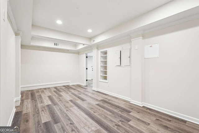 4508 Meadow Vista Trce, Lithonia, GA 30038 - spare room with wood finished floors, baseboards, recessed lighting, and built in shelves