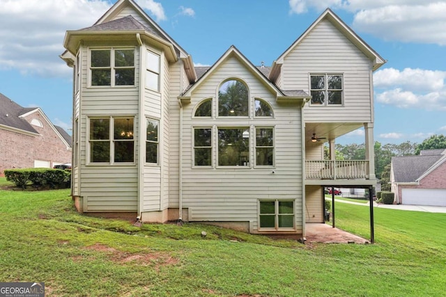 4508 Meadow Vista Trce, Lithonia, GA 30038 - back of house featuring a yard and a ceiling fan
