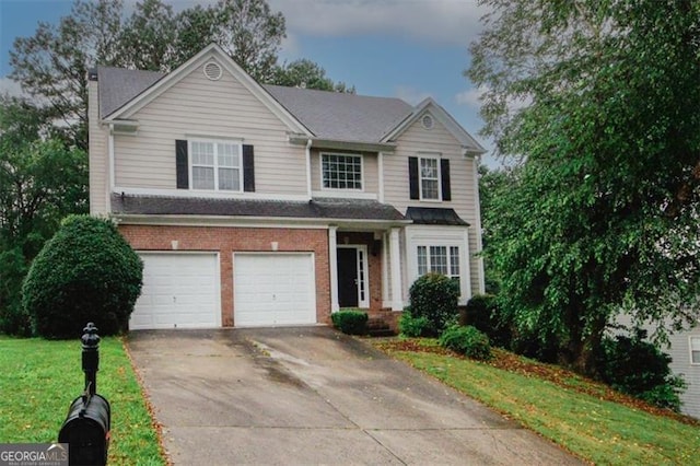 365 Hunt Crk, Acworth, GA 30101 - traditional-style house featuring an attached garage, concrete driveway, brick siding, and a front lawn
