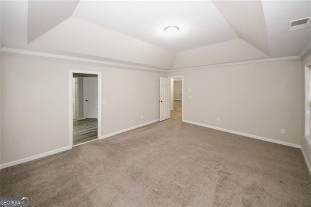 365 Hunt Crk, Acworth, GA 30101 - unfurnished bedroom featuring a raised ceiling, carpet, ornamental molding, and vaulted ceiling