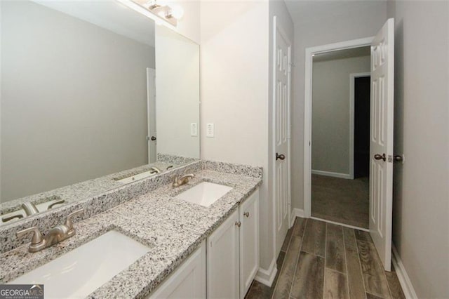 365 Hunt Crk, Acworth, GA 30101 - full bathroom with wood finished floors and double vanity