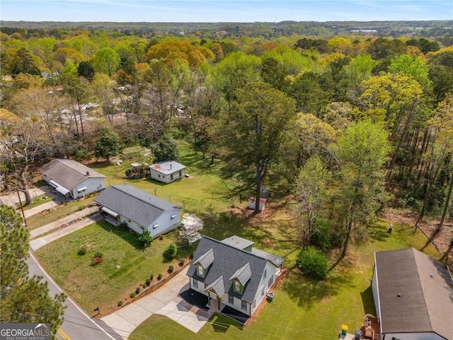 1071 N Price Rd, Sugar Hill, GA 30518 - drone / aerial view of a heavily wooded area