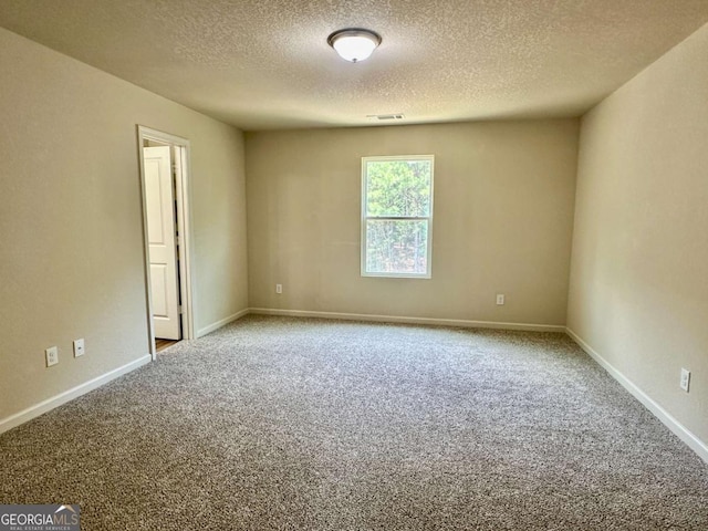 323 Morning Dr, Athens, GA 30606 - spare room with carpet and a textured ceiling