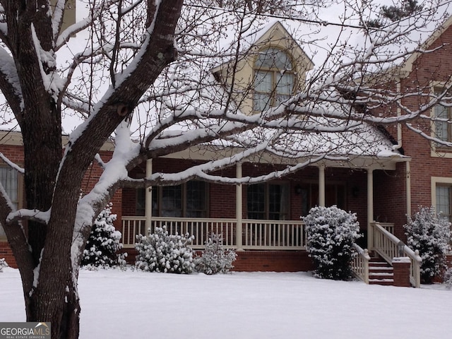 309 Cimarron Ct, Macon, GA 31220 - view of front of property with brick siding and a porch