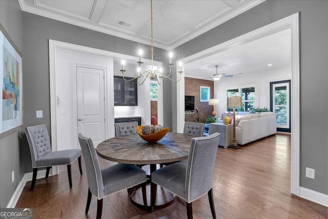 1099 Heyward Way, Alpharetta, GA 30009 - dining space with wood finished floors, ceiling fan, a chandelier, and ornamental molding