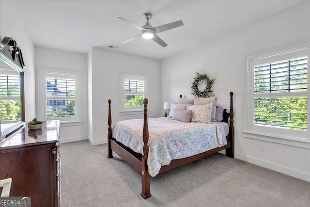 1099 Heyward Way, Alpharetta, GA 30009 - bedroom with light colored carpet and ceiling fan
