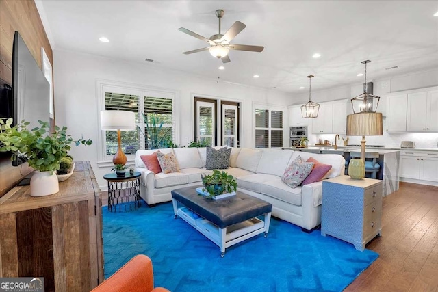 1099 Heyward Way, Alpharetta, GA 30009 - living area featuring a ceiling fan, hardwood / wood-style floors, and recessed lighting