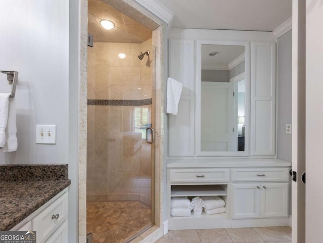 178 Rowland Pt, Morganton, GA 30560 - bathroom with vanity, a shower stall, crown molding, and tile patterned floors