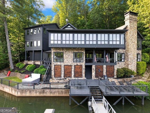 178 Rowland Pt, Morganton, GA 30560 - rear view of property featuring stone siding, stairs, a balcony, board and batten siding, and a deck with water view