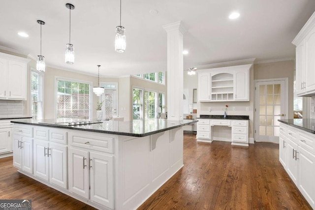 3741 Cape York Trce, Alpharetta, GA 30022 - kitchen with open shelves, crown molding, white cabinetry, a center island, and dark wood finished floors