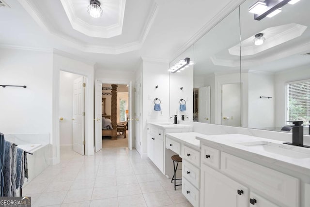 3741 Cape York Trce, Alpharetta, GA 30022 - ensuite bathroom featuring a tray ceiling, vanity, crown molding, tile patterned floors, and a bath