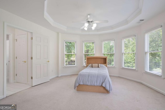 3741 Cape York Trce, Alpharetta, GA 30022 - carpeted bedroom featuring a tray ceiling, multiple windows, ornamental molding, and ceiling fan