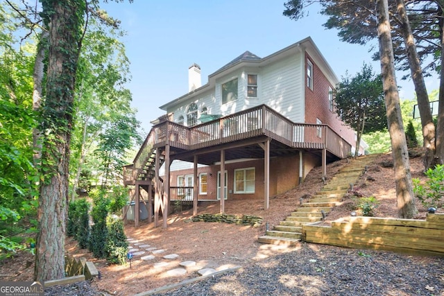 3741 Cape York Trce, Alpharetta, GA 30022 - view of front of home with stairway, a deck, and a chimney