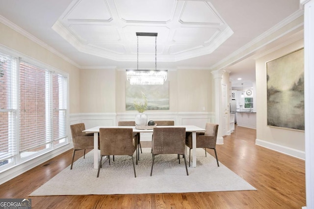 3741 Cape York Trce, Alpharetta, GA 30022 - dining space with wood finished floors, ornate columns, a chandelier, coffered ceiling, and ornamental molding