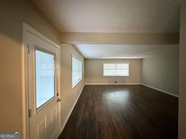 3456 Spring Cir, Decatur, GA 30032 - empty room featuring baseboards and dark wood finished floors