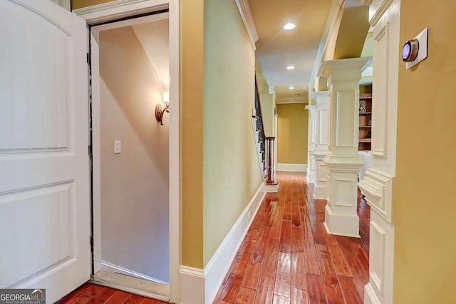 116 Archstone Sq, Mcdonough, GA 30253 - corridor featuring hardwood / wood-style floors, ornate columns, crown molding, and recessed lighting