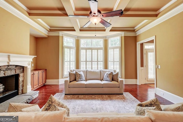 116 Archstone Sq, Mcdonough, GA 30253 - living room with dark wood-style floors, ceiling fan, plenty of natural light, coffered ceiling, and ornamental molding