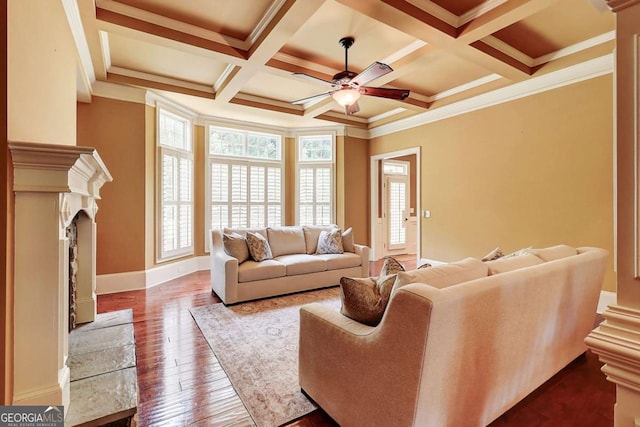 116 Archstone Sq, Mcdonough, GA 30253 - living room featuring ceiling fan, beam ceiling, dark wood-style floors, crown molding, and coffered ceiling