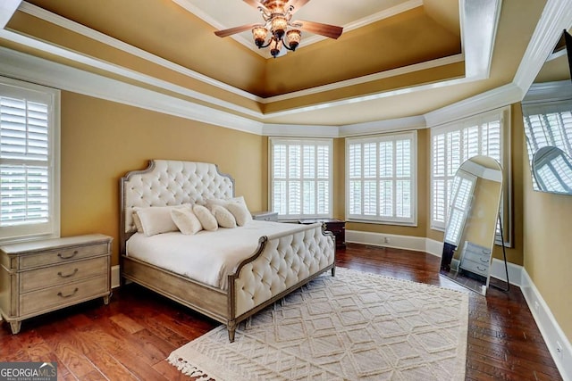 116 Archstone Sq, Mcdonough, GA 30253 - bedroom with a raised ceiling, hardwood / wood-style floors, crown molding, and ceiling fan