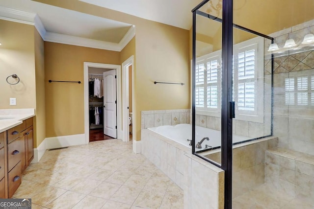 116 Archstone Sq, Mcdonough, GA 30253 - bathroom featuring a bath, a shower stall, vanity, crown molding, and tile patterned flooring