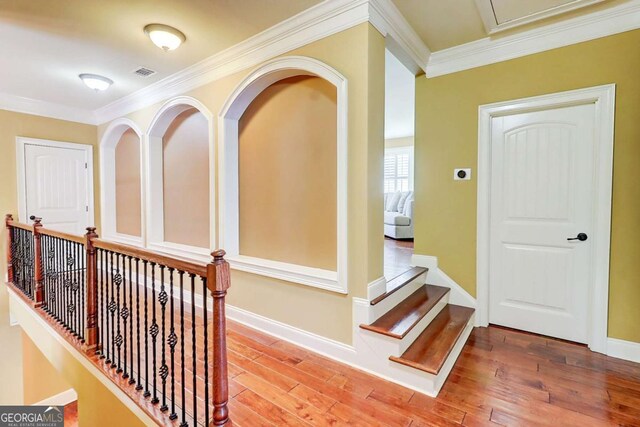 116 Archstone Sq, Mcdonough, GA 30253 - corridor with crown molding and wood finished floors