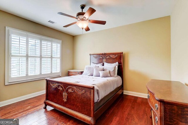 116 Archstone Sq, Mcdonough, GA 30253 - bedroom with dark wood-style flooring and a ceiling fan