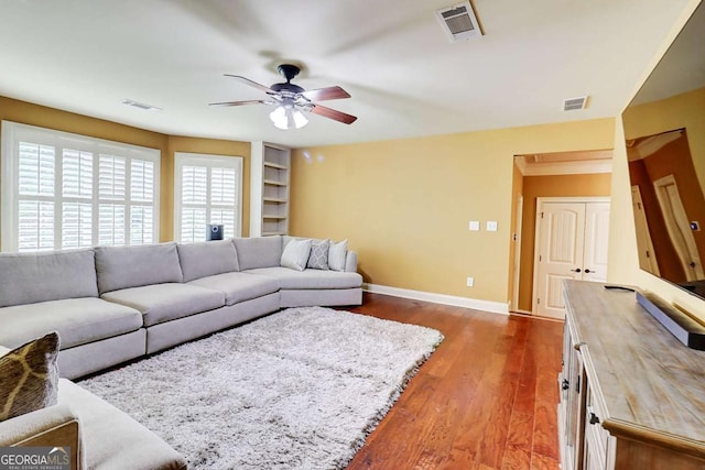 116 Archstone Sq, Mcdonough, GA 30253 - living room featuring ceiling fan and wood finished floors