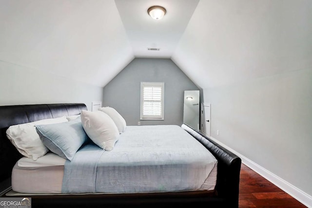 116 Archstone Sq, Mcdonough, GA 30253 - bedroom with wood finished floors and lofted ceiling