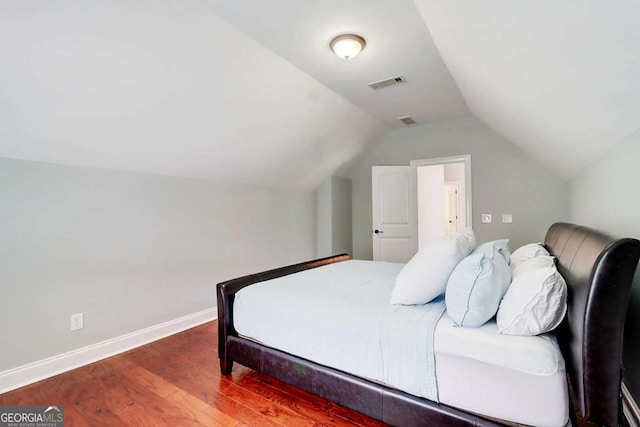116 Archstone Sq, Mcdonough, GA 30253 - bedroom with wood finished floors and lofted ceiling