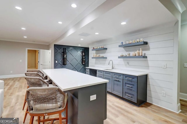 116 Archstone Sq, Mcdonough, GA 30253 - indoor wet bar with light wood-style floors and recessed lighting