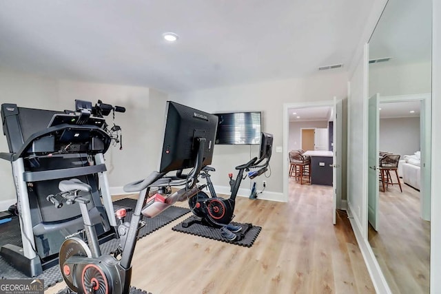 116 Archstone Sq, Mcdonough, GA 30253 - workout area featuring wood finished floors and recessed lighting