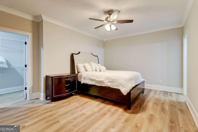 116 Archstone Sq, Mcdonough, GA 30253 - bedroom with light wood-type flooring, ornamental molding, and ceiling fan