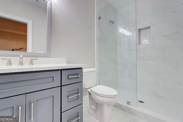 116 Archstone Sq, Mcdonough, GA 30253 - bathroom with tiled shower, vanity, and marble finish flooring