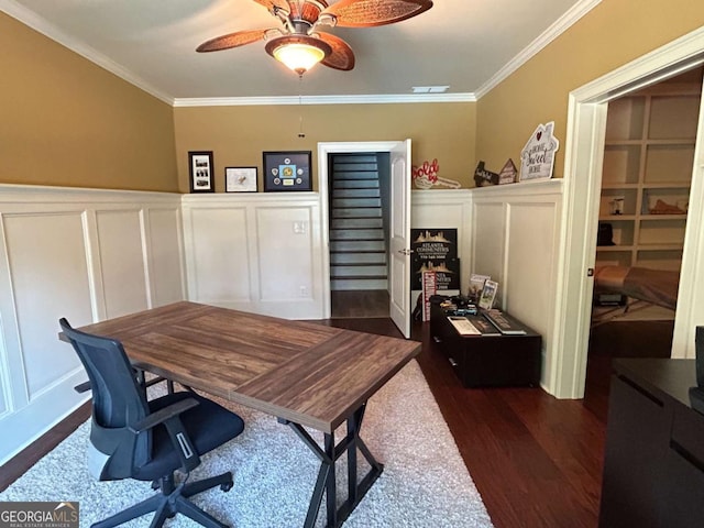 116 Archstone Sq, Mcdonough, GA 30253 - office area featuring a decorative wall, ornamental molding, ceiling fan, dark wood-style flooring, and a wainscoted wall