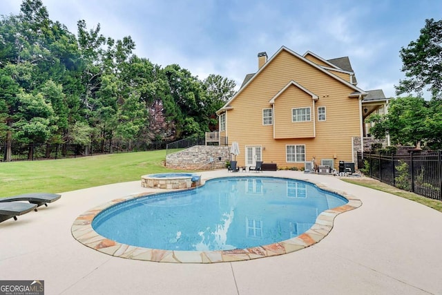 116 Archstone Sq, Mcdonough, GA 30253 - view of swimming pool featuring a fenced backyard, a patio area, a pool with connected hot tub, and view of scattered trees