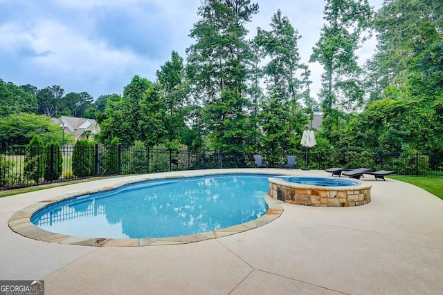 116 Archstone Sq, Mcdonough, GA 30253 - view of pool featuring a patio area, a pool with connected hot tub, and view of scattered trees