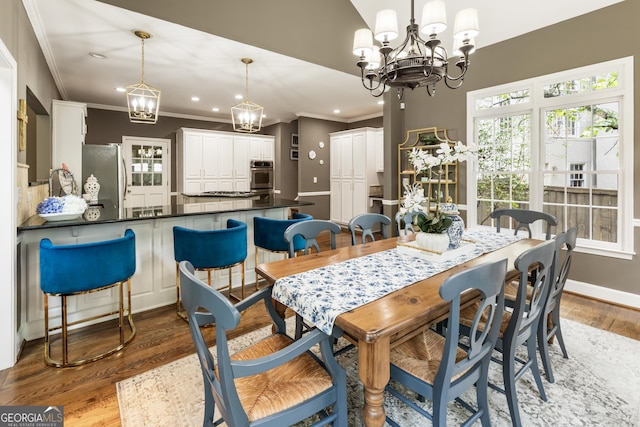 10530 Tuxford Dr, Alpharetta, GA 30022 - dining room featuring a chandelier, light wood-type flooring, ornamental molding, and recessed lighting