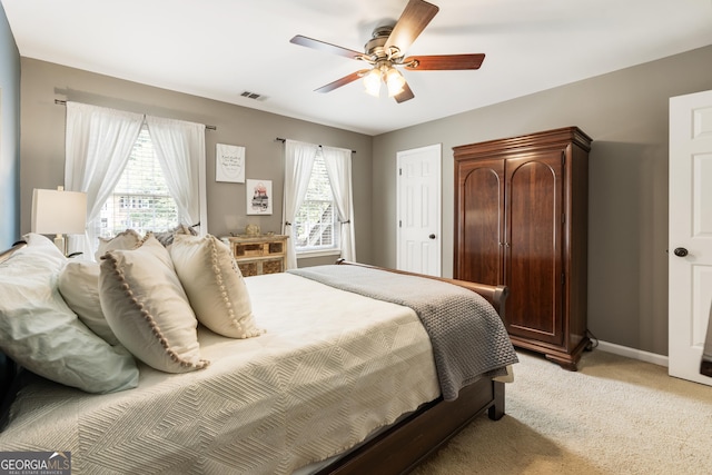 10530 Tuxford Dr, Alpharetta, GA 30022 - bedroom with light carpet and a ceiling fan