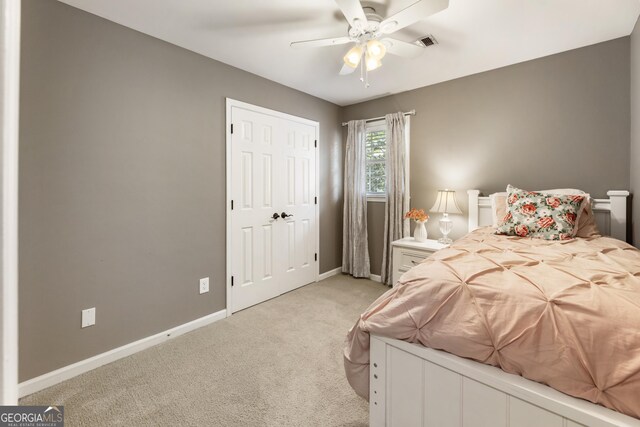 10530 Tuxford Dr, Alpharetta, GA 30022 - bedroom with light colored carpet and a ceiling fan