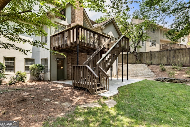 10530 Tuxford Dr, Alpharetta, GA 30022 - rear view of property with a wooden deck, stairs, a patio area, and stucco siding