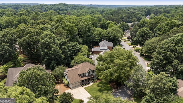 10530 Tuxford Dr, Alpharetta, GA 30022 - aerial overview of property's location with a forest and nearby suburban area