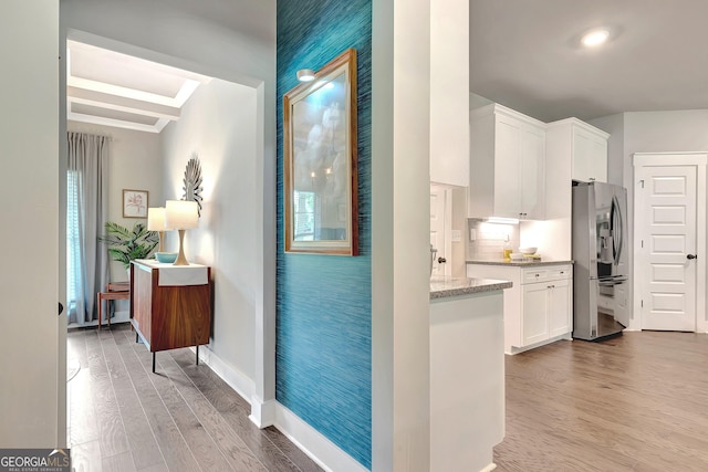 29 Peppertree Dr, Newnan, GA 30265 - hall featuring light wood-type flooring and baseboards