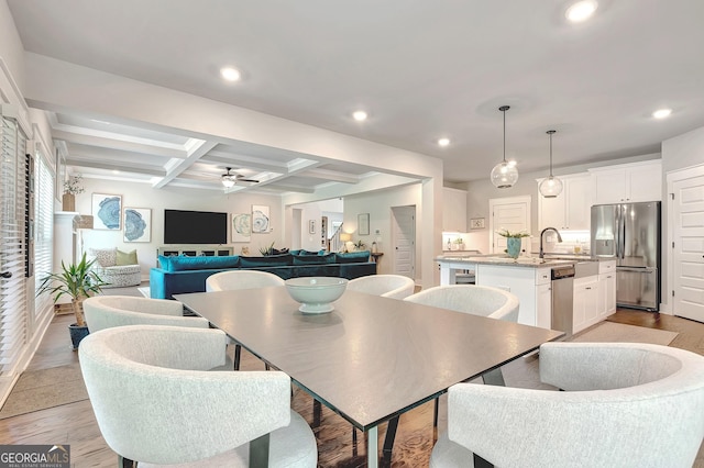 29 Peppertree Dr, Newnan, GA 30265 - dining area featuring a ceiling fan, coffered ceiling, recessed lighting, beamed ceiling, and light wood finished floors